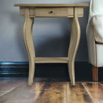 26" Beige Manufactured Wood Oval End Table With Drawer And Shelf - Montana Home & Kitchen Co.